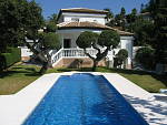 Charming villa with swimming pool, mature gardens and open views