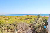 Адосадо в Торревьхе в 150 метрах от пляжа, напротив природного парка La Mata