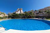 Exceptionally spacious 3 bedroom townhouses with underground garage in a gated community with open views and 2 swimming pools, La Duquesa