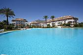 Immaculate new build 2 bedroom ground floor apartment with private garden area overlooking Dama de Noche Golf, Marbella